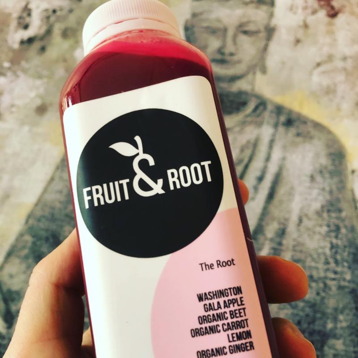 A bottle of Fruit and Root cold-pressed juice, The Root blend
